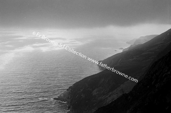 SLIEVE LEAGUE SUNLIGHT ON SEA THROUGH MIST AND CLIFFS